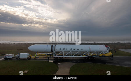 The Northrop Grumman Antares rocket, with Cygnus resupply spacecraft onboard, is rolled out to launch Pad-0A at the NASA Wallops Flight Facility April 15, 2019  in Wallops, Virginia. The rocket is schedule to deliver 7,600 pounds of science and research, crew supplies and vehicle hardware to the International Space Station on April 17th.