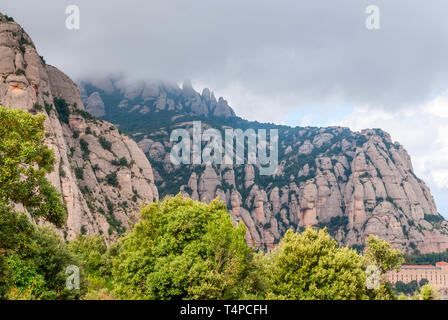 Santa Maria de Montserrat Abbey in Monistrol de Montserrat, Catalonia, Spain. Famous for the Virgin of Montserrat. Stock Photo