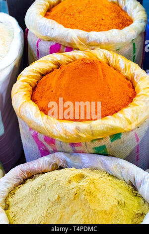 Colorful spices powders of curry and chilli traditional spicy street market in New Delhi. India Stock Photo
