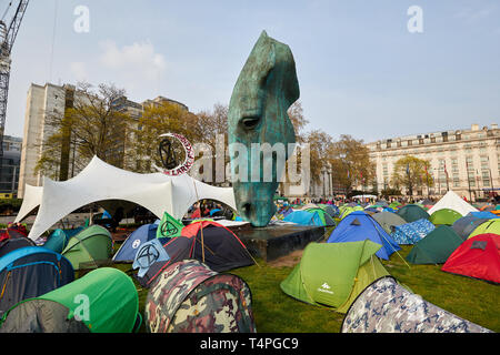 London, UK. - April 17, 2019: A camp-site established on the Marble Arch roundabout by members of  Extinction Rebellion during protests in the capital Stock Photo