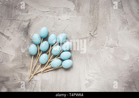 Yellow Easter Wooden Sticks For Finger Food On A Gray Background 