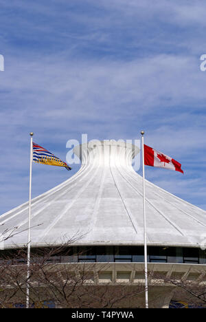 Canadian and British Columbia flags with H.R. MacMillan Space Centre planetarium in background, Vancouver, BC, Canada Stock Photo