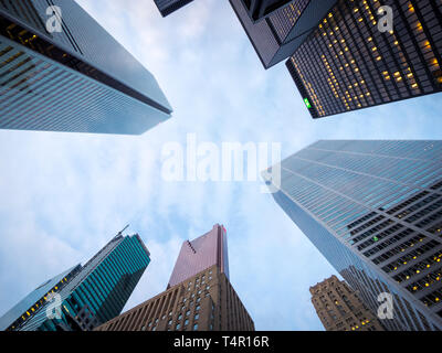 Looking up at the tall bank office towers at the intersection of Bay Street and King Street in the heart of the Financial District, Toronto, Canada. Stock Photo