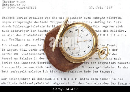 Adolf Hitler - a presentation pocket watch to Reichsführer-SS Heinrich Himmler, Christmas 1935 - made by Lange & Söhne/Glashütte i./Sa. Gold hunter case pocket watch. Several marks, fineness '0.585', crown and company name 'Glashütte A. Lange & Söhn 20th century, Editorial-Use-Only Stock Photo