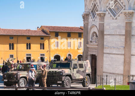 PISA, ITALY - APRIL, 15 2019: Italian military guarding the Leaning Tower of Pisa to prevent terrorist attacks Stock Photo