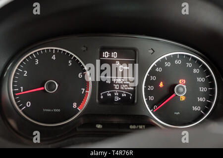 driving on empty fuel tank - fuel gauge showing 0 miles to empty Stock Photo