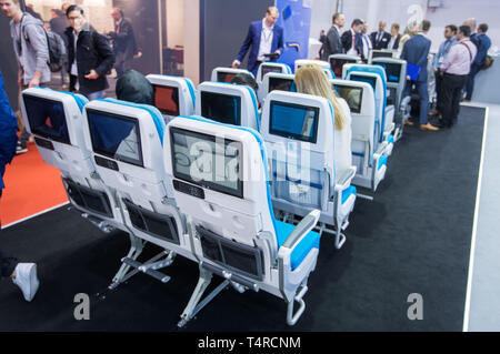 Hamburg, Germany. 03rd Apr, 2019. The ZIM Aircraft Equipment stand at the Aircraft Interiors Expo. More than 500 exhibitors present news and innovations for the aircraft cabin at the fair. Credit: Jens Büttner/dpa-Zentralbild/ZB/dpa/Alamy Live News Stock Photo