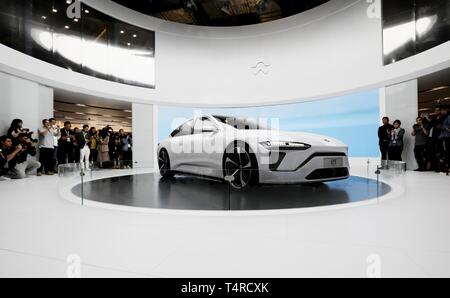 Beijing, China. 16th Apr, 2019. Visitors view a Nio eT Preview electric sedan during the 18th Shanghai International Automobile Industry Exhibition in Shanghai, east China, April 16, 2019. Credit: Fang Zhe/Xinhua/Alamy Live News