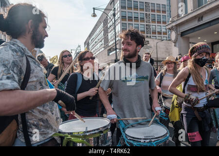 London, UK. 18th Apr, 2019. Protesters playing music during the Extinction Rebellion Strike in London.Extinction Rebellion have blocked five central London landmarks for fourth day in protest against government inaction on climate change. Credit: Sam Lees/SOPA Images/ZUMA Wire/Alamy Live News Stock Photo