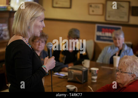 Creston, Iowa, USA. 18th Apr, 2019. New York Democratic Senator Kirsten Gillibrand campaigns for President of the United States as she speaks during a ''listening tour'' stop at at the Adams Street Espresso & Soda Shoppe in Creston, Iowa. More than a dozen Democratic party candidates are campaigning in the state of Iowa to win the Iowa Democratic Caucuses February 3, 2020. Credit: ZUMA Press, Inc./Alamy Live News Stock Photo