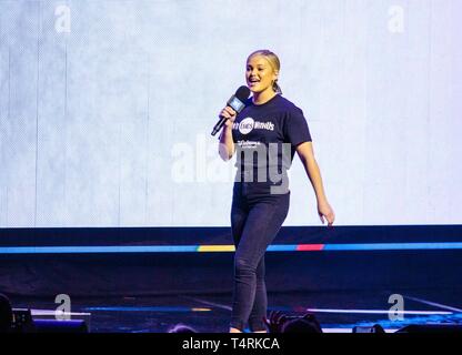 Tacoma, Washington, USA. 18th Apr, 2019. Actress Olivia Holt speaks during WE Day: Washington at The Tacoma Dome on April 18th, 2019 in Tacoma, Washington. Photo: Xander Deccio/ImageSPACE/MediaPunch Credit: MediaPunch Inc/Alamy Live News Stock Photo