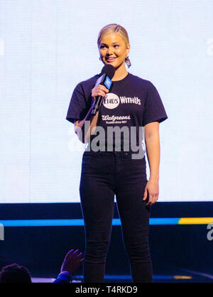 Tacoma, Washington, USA. 18th Apr, 2019. Actress Olivia Holt speaks during WE Day: Washington at The Tacoma Dome on April 18th, 2019 in Tacoma, Washington. Photo Xander Deccio/ImageSPACE/MediaPunch Credit: MediaPunch Inc/Alamy Live News Stock Photo