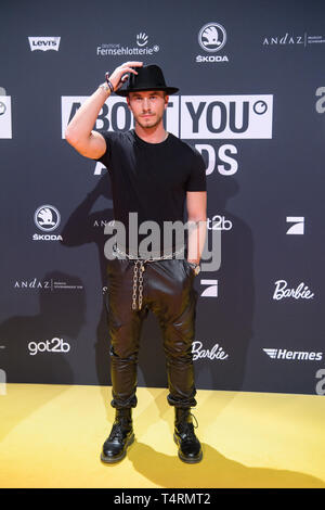 18 April 2019, Bavaria, Grünwald: Louis Darcis, model, comes to the presentation of the 'About you' awards to the social media personalities of the year in the Bavaria film city. Photo: Matthias Balk/dpa Stock Photo