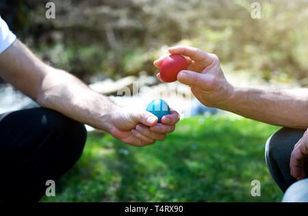 People knocking eggs on Easter day close up Stock Photo