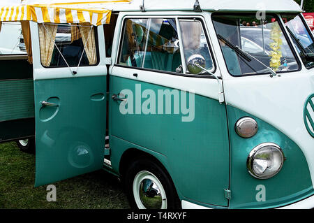 A 1964 VW Camper van on display at a car show Stock Photo