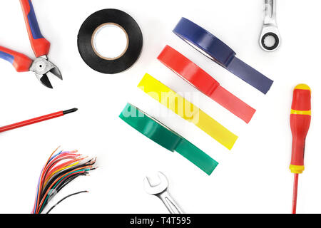 Composition of tools for the electrician repair and its protection and safety on a white isolate background. Stock Photo