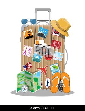 Plastic travel bag. Plastic case with wheels. Hat, photo camera, eyeglasses, paper map, compass, flip flops. Labels places all over the world. Baggage Stock Vector