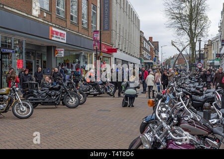 Harley Davidson motor bikes lining Abington Street in the town centre of Northampton, UK; part of an annual charity fund raiser Stock Photo