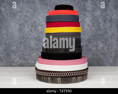 Ribbon of different colors in coils. Stock Photo