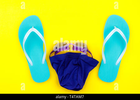 Swimming set - slippers, towel, goggles and swimming cap Stock Photo