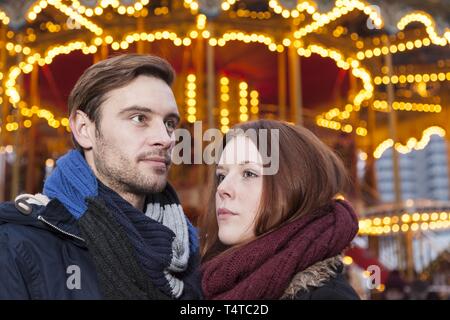 A couple doesn't look in each others eyes, Christmas Market, Germany, Europe Stock Photo