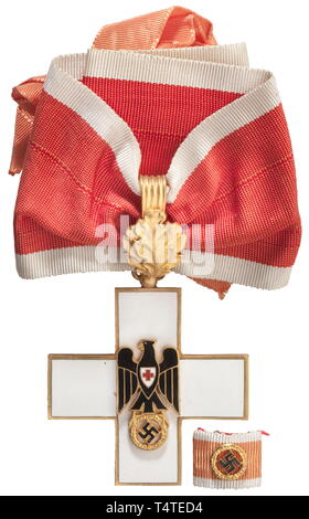 A German Red Cross Honour Badge, 3rd Model, 1st Class. Neck cross, gilt and enamelled with separately applied eagle, customised neck ribbon. Together with the miniature in a red award presentation case (Nie 6.07.03 d). The award document dated 23 January 1937 to a General Director with signature in ink of Duke Carl Eduard. historic, historical, awards, award, German Reich, Third Reich, Nazi era, National Socialism, object, objects, stills, medal, decoration, medals, decorations, clipping, cut out, cut-out, cut-outs, honor, honour, National Socialist, Nazi, Nazi period, 20th, Editorial-Use-Only Stock Photo