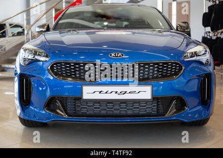 Russia, Izhevsk - April 4, 2019: Showroom KIA. New sports car Stinger in dealer showroom. Modern and prestigious vehicles. Stock Photo