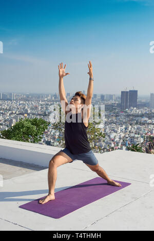 Man practicing advanced yoga. A series of yoga poses. lifestyle concept. Stock Photo