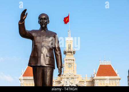 Statue of Ho Chi Minh at the northern end of Nguyen Hue Boulevard, outside the Hotel de Ville (city halls) a French designed neo-baroque building now  Stock Photo