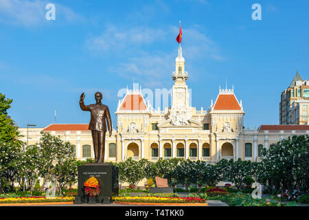 Statue of Ho Chi Minh at the northern end of Nguyen Hue Boulevard, outside the Hotel de Ville (city halls) a French designed neo-baroque building now  Stock Photo