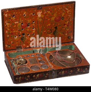 A set of Persian coin scales Qajar period, 19th century. Rectangular wood case, the sides decorated with floral cartouches. On the hinged and painted lid a portrayal of Fath Ali Shah amidst his courtiers framed by a floral border. The interior with polychrome and gold painting on an orange ground. Inside two differently sized iron coin scales with curved brass pans, the smaller ones with master´s mark 'Hashim'. Including ten iron weights engraved at top and two tare weights in a fold-out compartment. Size of case 31.7 x 19.7 x 5.5 cm. Cf. Francis, Additional-Rights-Clearance-Info-Not-Available Stock Photo