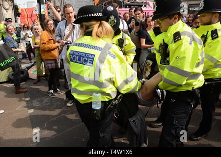 Extinction Rebellion rebel in Central London, bringing the centre of the city to a halt on 19th April 2019.