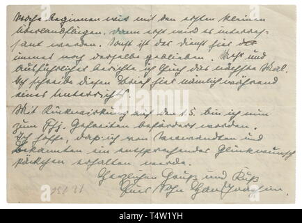 Hans Joachim Marseille - a letter to his parents. Hand-written, double-sided letter from the successful fighter pilot. He describes his 75th solo flight, further training in various aircraft types and his promotion to Gefreiter effective 1 May 1939. The letter closes with 'Herzlichen Gruß und Kuß - Euer Sohn Hans Joachim' (affectionate regards and a kiss - your son Hans Joachim). Ink on paper, perforated on left side, dimensions 21 x 14.5 cm, double-folded and minimally stained. Hans Joachim Marseille, the 'Star of Africa', was the fourth winner of the Diamonds to the Knigh, Editorial-Use-Only Stock Photo