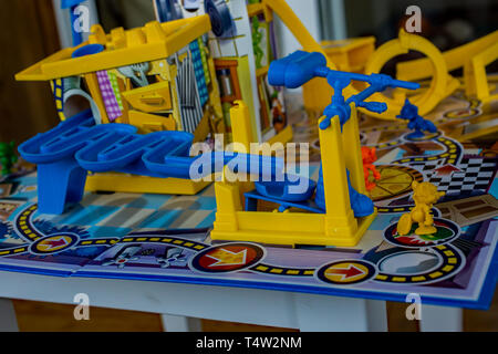 Close up or Hasbro Mousetrap game all boxed up on a wooden floor ready to be played and enjoyed. Mousetrap has been around since 1962, and whilst it h Stock Photo