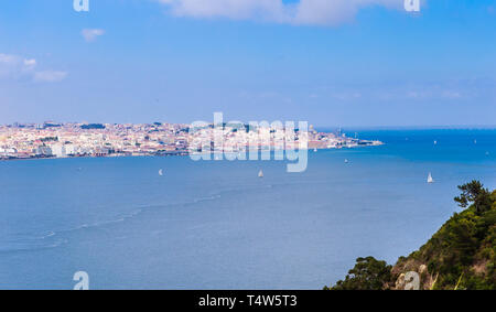 Panoramic view from Almada across the Tagus River at Lisbon, Portugal Stock Photo