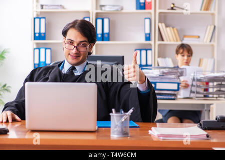 Two lawyers working in the office Stock Photo