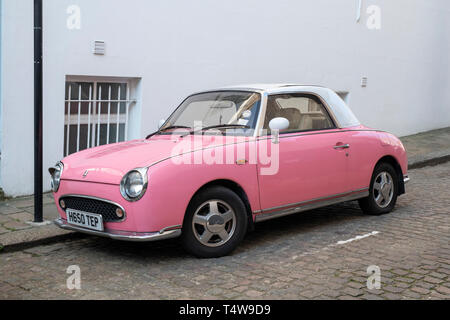 pink 1991 nissan figaro