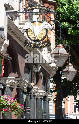 The Swan Pub sign, Hammersmith Broadway, Hammersmith, London Borough of Hammersmith and Fulham, Greater London, England, United Kingdom Stock Photo