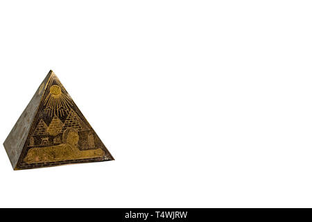 Figurine of egyptian pyramid with copy space background Stock Photo