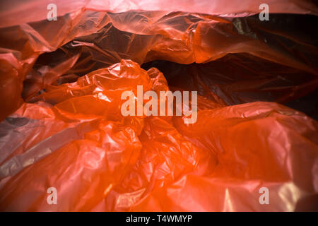 Inside a disposable plastic bag. Lightweight transparent, reusable plastic waste. Rubbish bag, plastic recycling, environmental issues Stock Photo