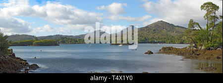 View of Gowlbeg and Sugarloaf with Friar's and Bark Islands and Shrone Hill in the Foreground on the Shore of the Bamboo Park Glengarrif Stock Photo