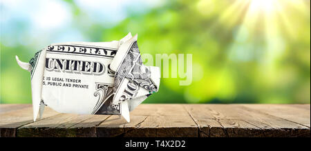 Money in the shape of a pig. Stock Photo