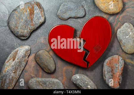 Broken wooden red heart on background Stock Photo - Alamy Broken wooden red heart on background Stock Photo - Alamy