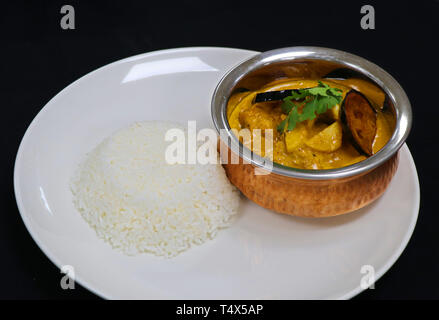 Thai yellow chicken curry with jasmine rice Stock Photo