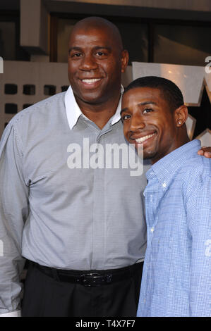 Earvin Magic Johnson and son Andre Johnson at the This Christmas, WireImage