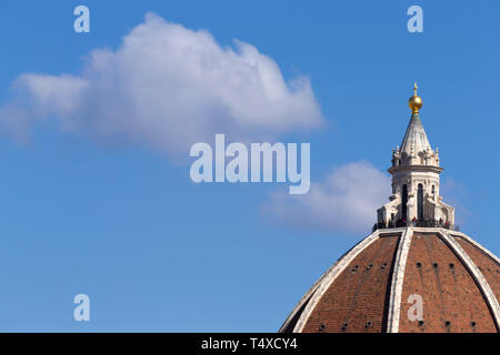 Tourists enjoy the view from the balcony on the cupola of Filippo Brunelleschi's dome, the Duomo, Florence, Tuscany, Italy Stock Photo