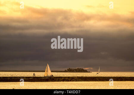 Cherbourg-Octeville, France - August 21, 2018: Sailboat in the harbor of Cherbourg during sunset. Normandy, France Stock Photo