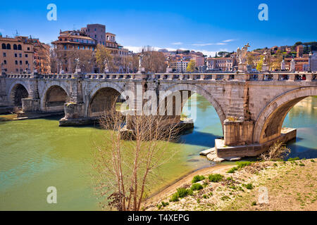 Ancient Ponte Sant Angelo stone bridge on Tiber river of Rome, capital of Italy Stock Photo