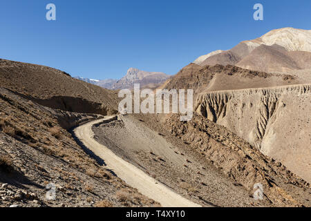 mountain road from the Kagbeni village to Muktinath, lower Mustang District, Nepal Stock Photo