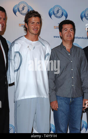 LOS ANGELES, CA. June 02, 2005: International soccer superstar DAVID BECKHAM (left) with American Idol creator SIMON FULLER at the launch for the David Beckham Academy at the Home Depot Center in Southern California. The Academy will lay the foundation for many young Americans to learn soccer. © 2005 Paul Smith / Featureflash Stock Photo